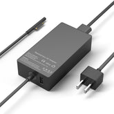 YBRUZRUB frontal del adaptador Surface mostrando diseño compacto y carga segura