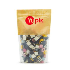 Yupik frente del empaque mostrando mezcla variada y atractivo visual