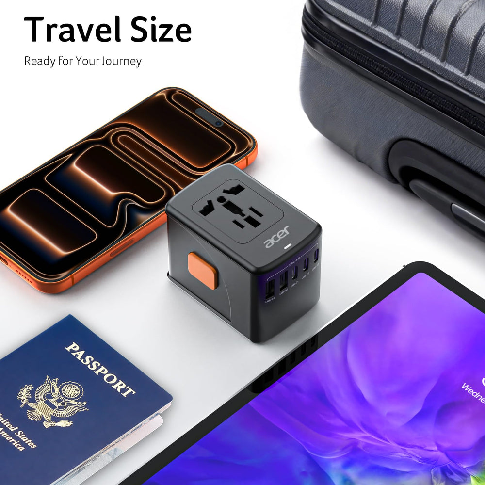 Acer adaptador junto a moneda para mostrar tamaño compacto