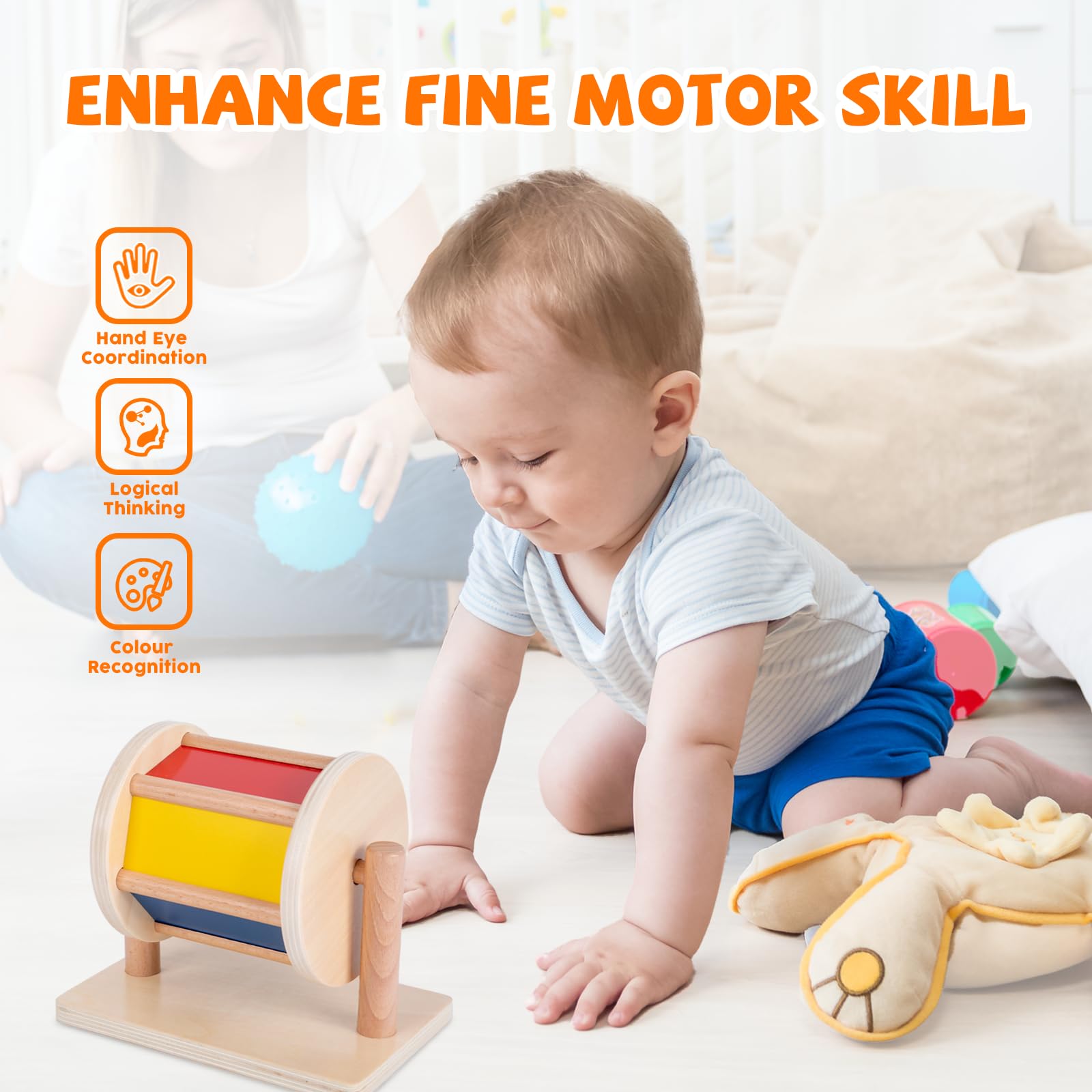 Adena Montessori bebé empujando el tambor durante tummy time para fortalecer cuello