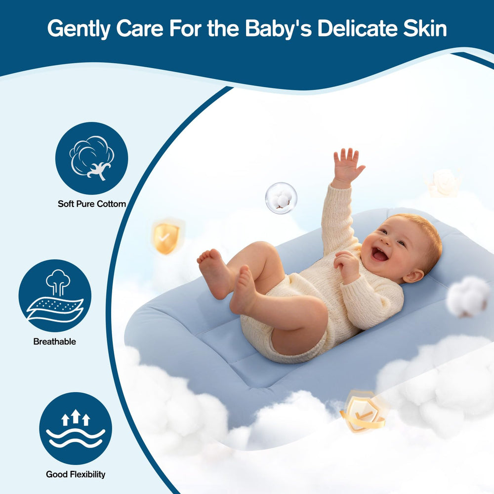 Ainiuke bebé en tummy time demostrando apoyo confortable