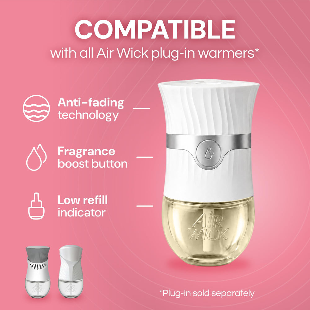 Air Wick recarga junto a mano para comparar tamaño y facilidad de uso