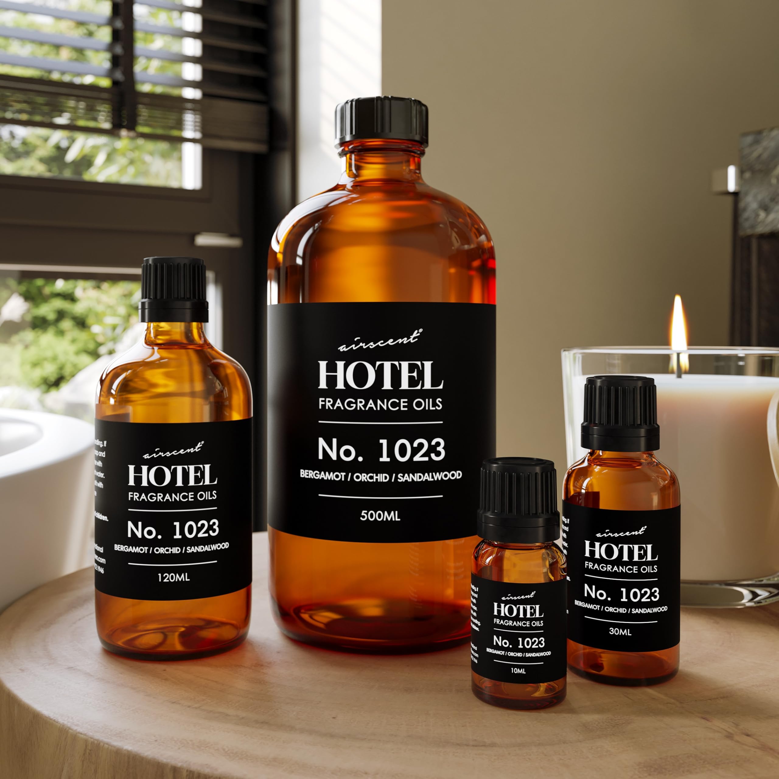 Air-Scent botella junto a una regla para comparar tamaño y capacidad