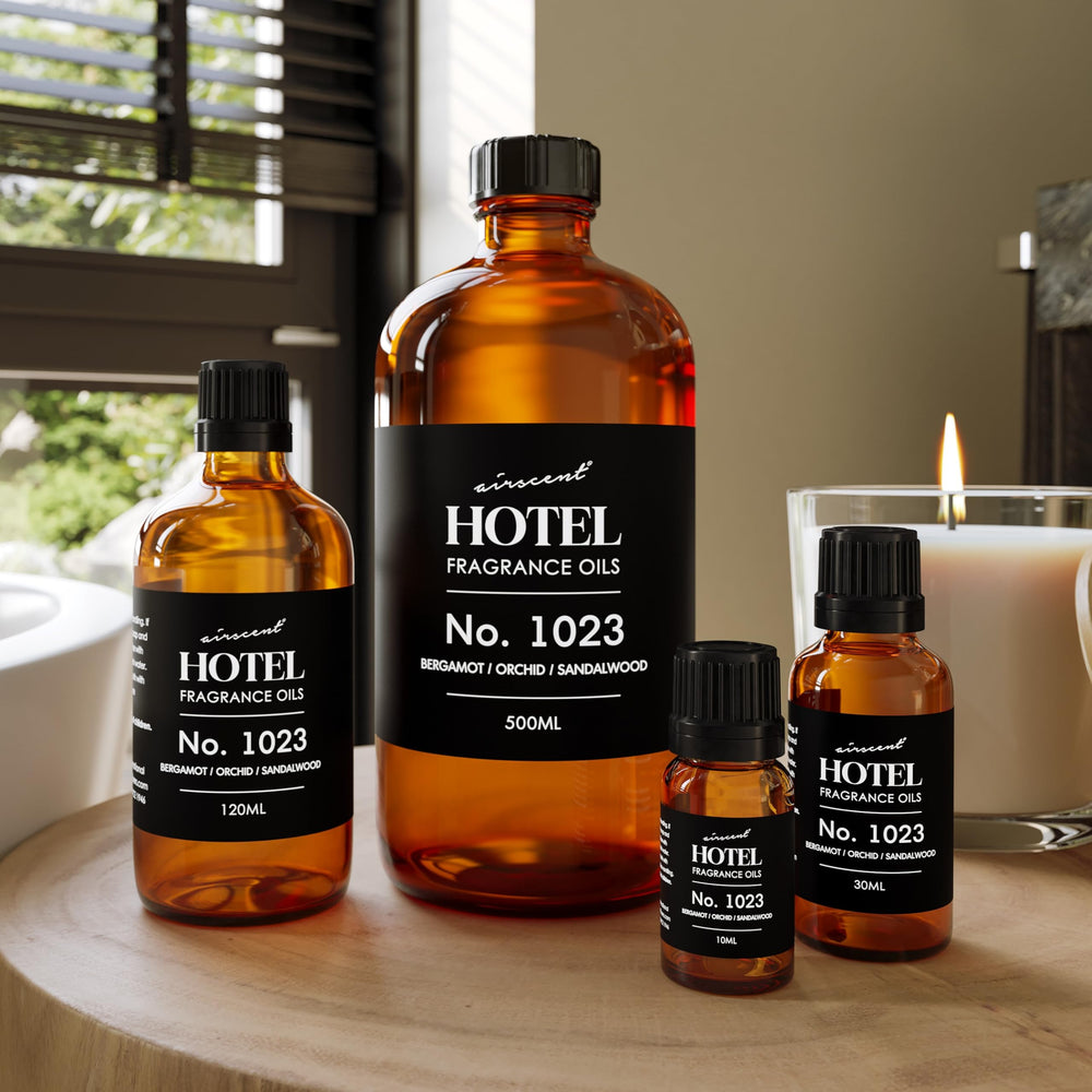 Air-Scent botella junto a una regla para comparar tamaño y capacidad
