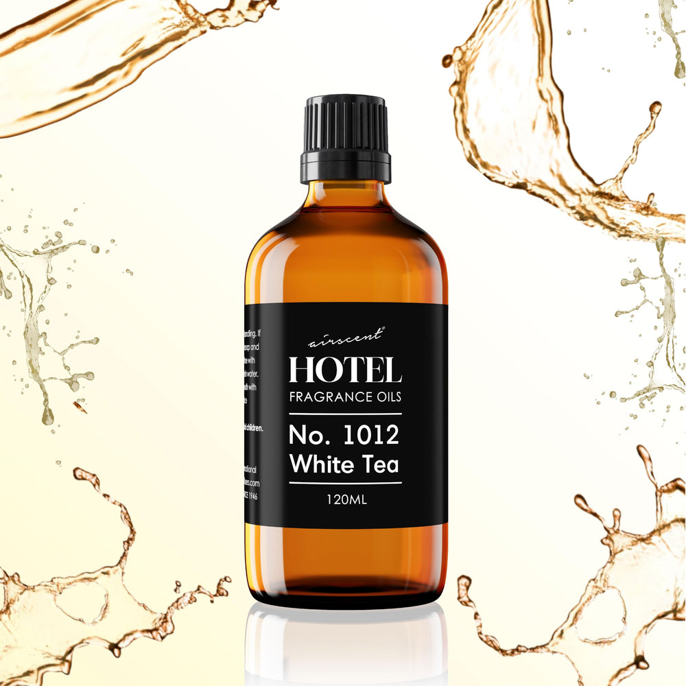 Air-Scent aceite en difusor dentro de sala proyectando aroma elegante