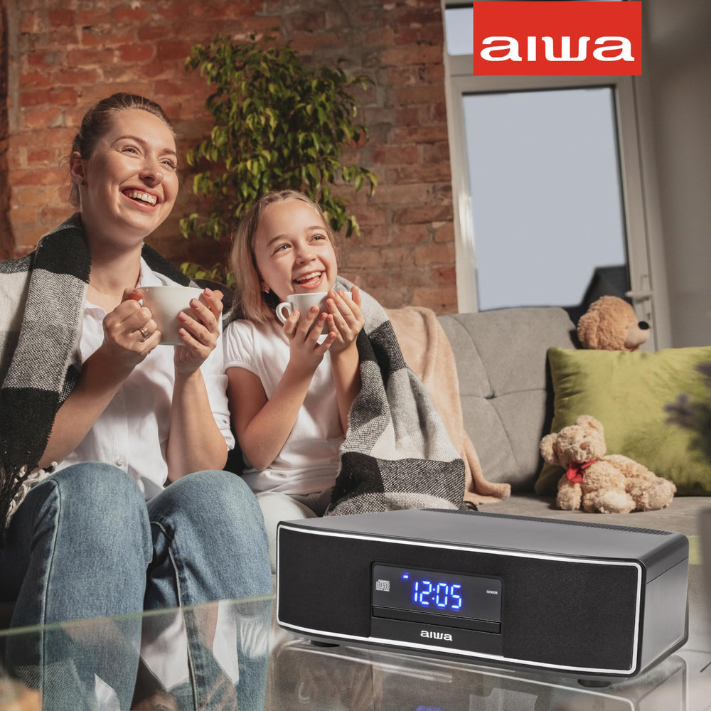 AIWA altavoz junto a televisor conectado por óptico, mejora del sonido