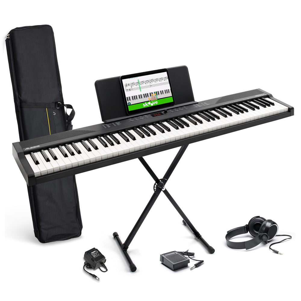 Alesis Recital Play frente completo mostrando teclado y altavoces para práctica realista