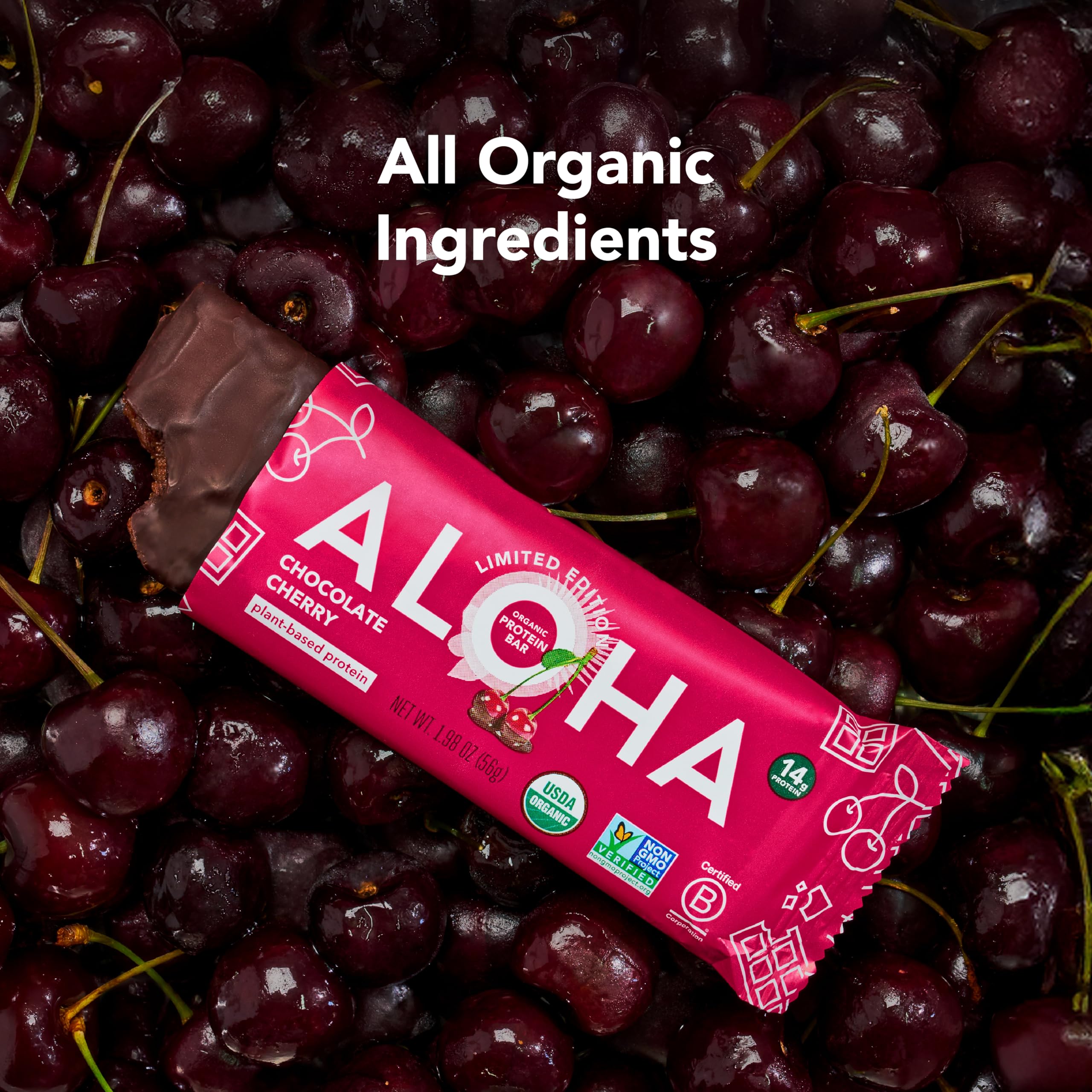 ALOHA barra junto a cerezas frescas para comparar tamaño y autenticidad de ingredientes