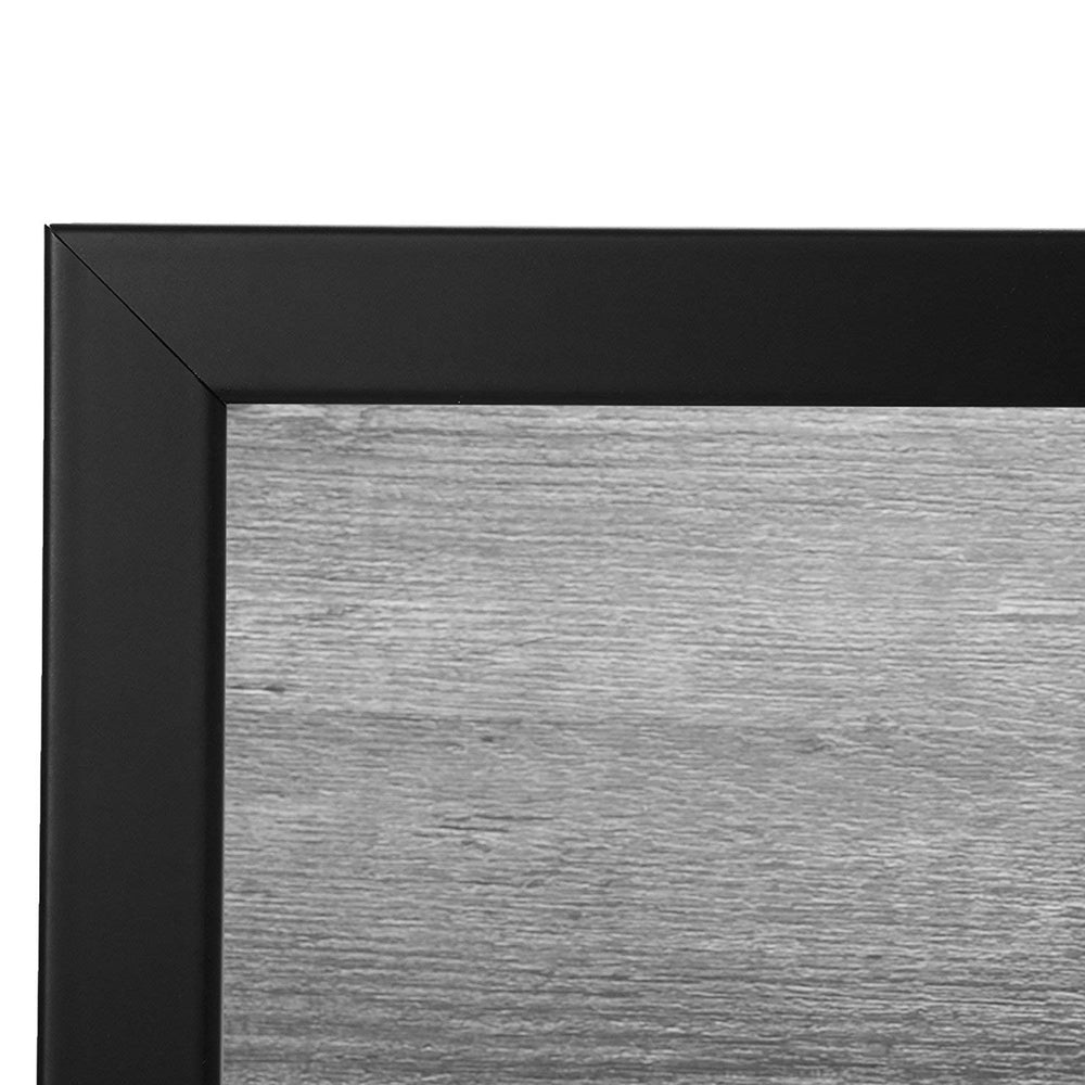 Americanflat frame held by hand showing scale and lightweight convenience for easy hanging