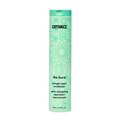 amika frente del envase 275ml mostrando diseño y beneficio fortalecedor