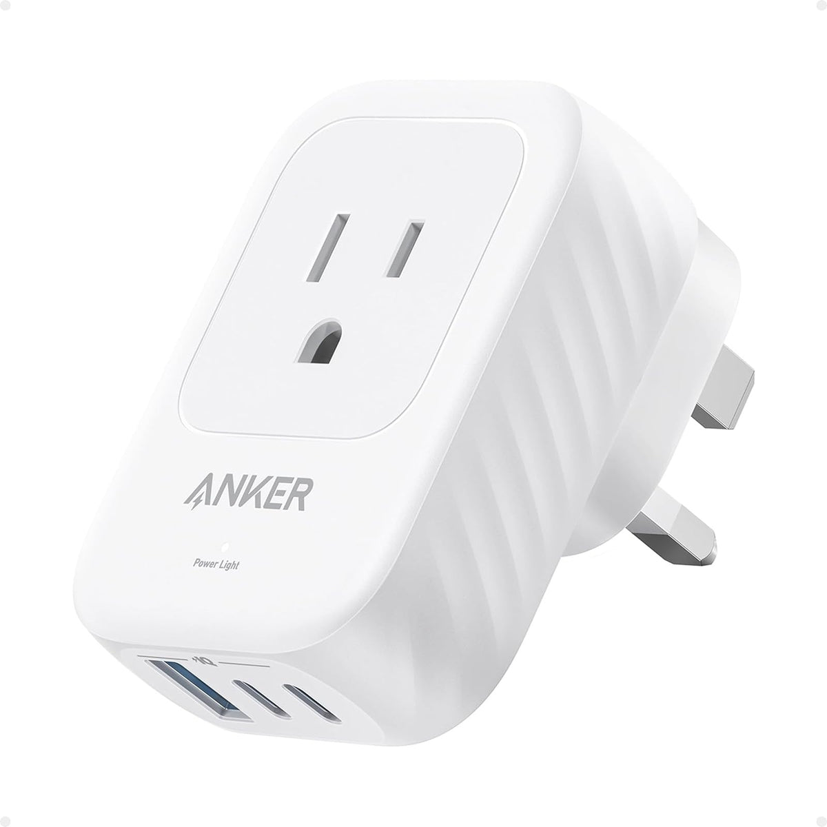 Anker adaptador de viaje frente mostrando clavijas Type G y forma compacta para transporte seguro