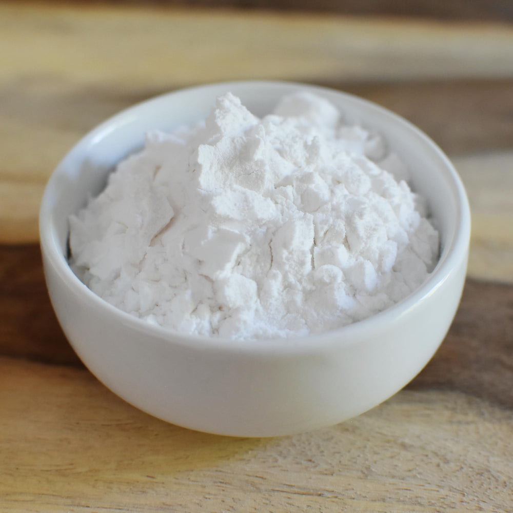 Cucharas medidoras con Anthony's tapioca mostrando cantidad útil por receta