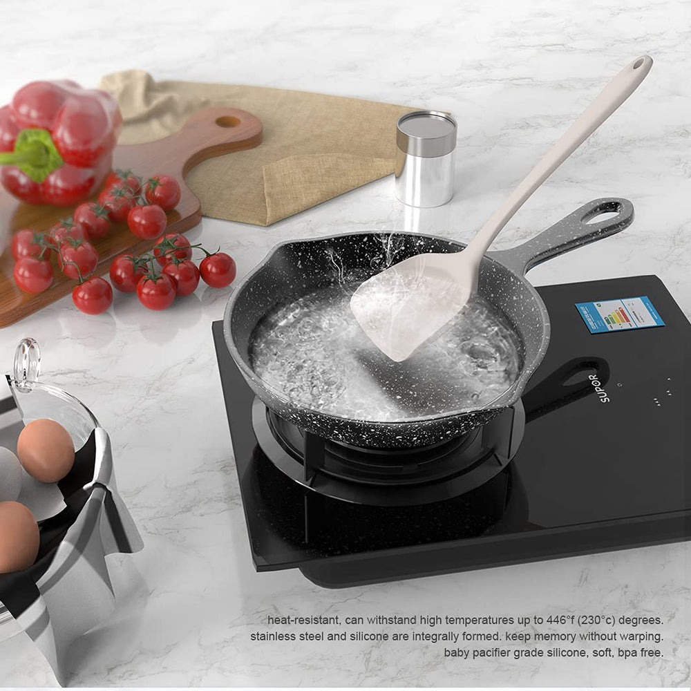 AOTHOD whisk and tongs in use showing versatile cooking performance