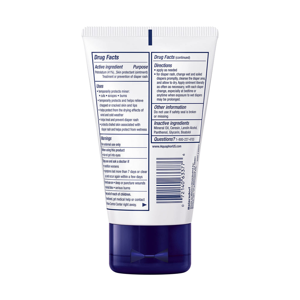 Happy baby with Aquaphor used on cheeks showing comfort and care
