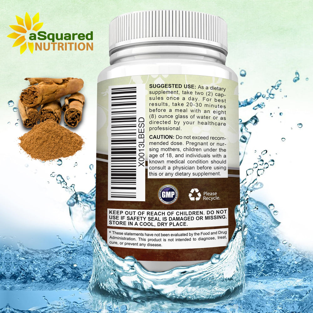 aSquared Nutrition cápsula junto a monedas para comparar tamaño