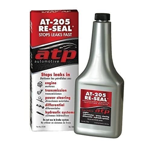 ATP Automotive AT-205 being poured into fluid reservoir demonstrating easy application