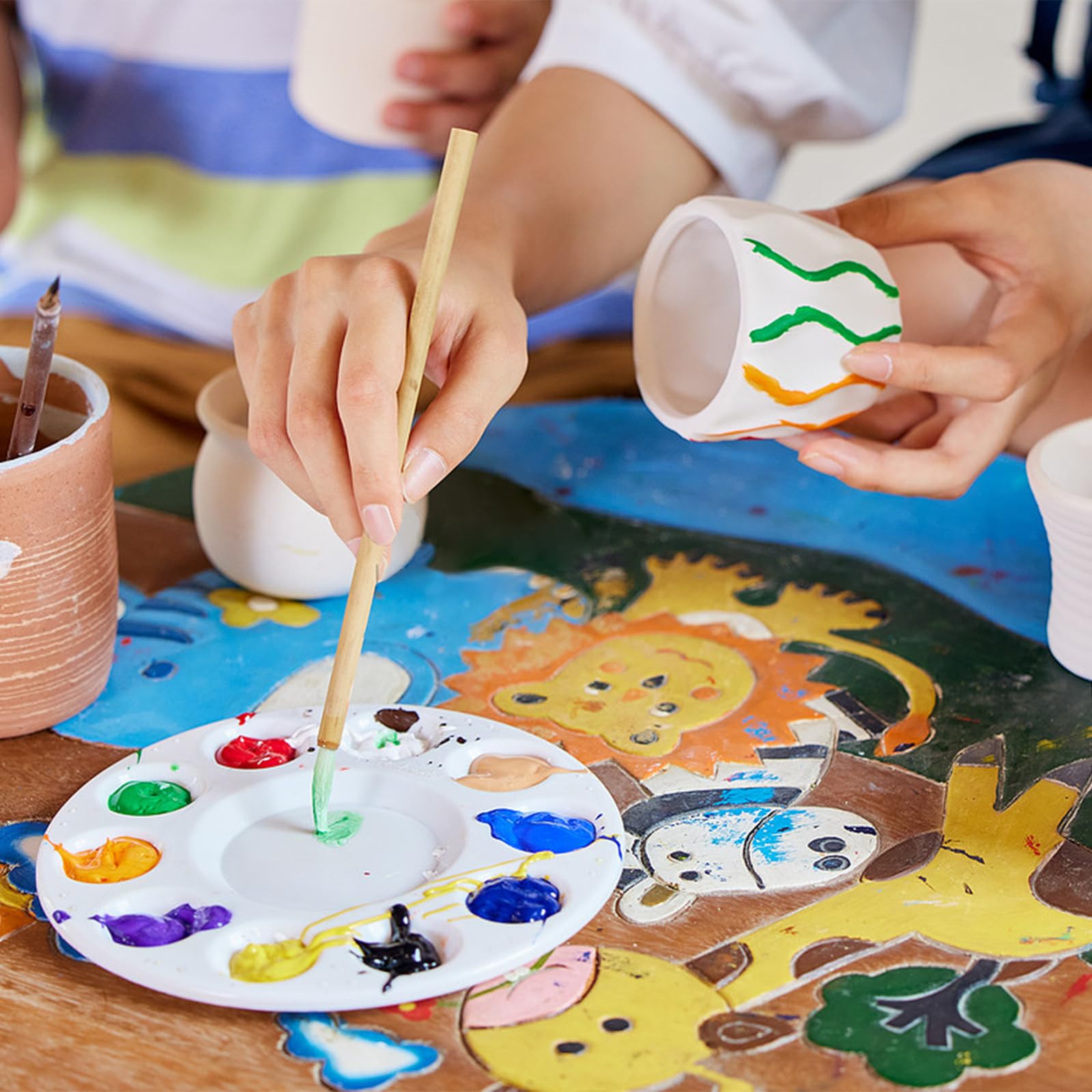 Aujazyble comparación de tamaño con mano para ver escala y ergonomía infantil