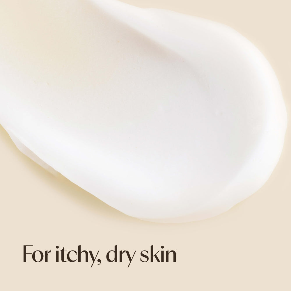 Comparación de tamaño Aveeno 33 fl oz con mano, gran rendimiento doméstico