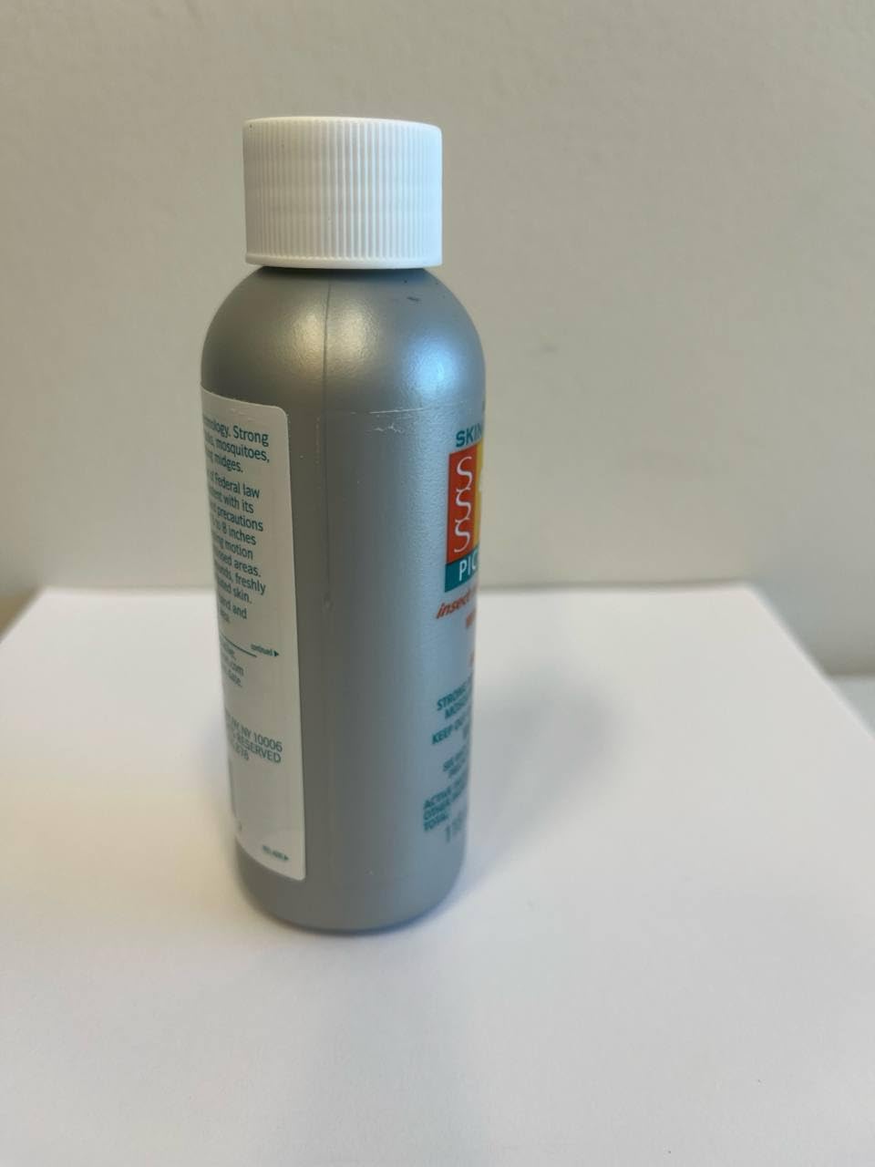 AVON botella dentro de bolso lista para viaje y uso inmediato