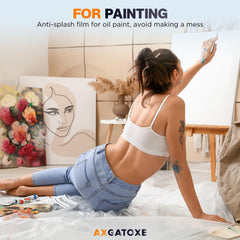 Axgatoxe en uso durante pintura protegiendo suelos y evitando salpicaduras