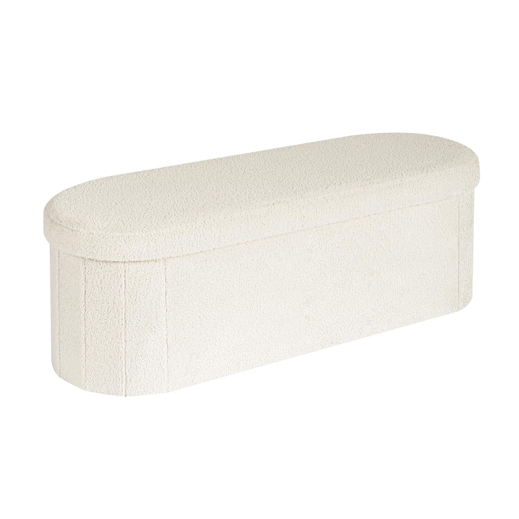 B FSOBEIIALEO front view of ottoman showcasing clean silhouette and cream sherpa