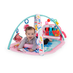 Baby Einstein bebé en tummy time usando la almohadilla de soporte, fortalece cuello