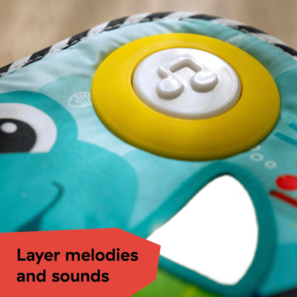 Baby Einstein battery compartment open showing easy battery access