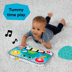 Baby Einstein pad attached to crib rails for secure reclined play