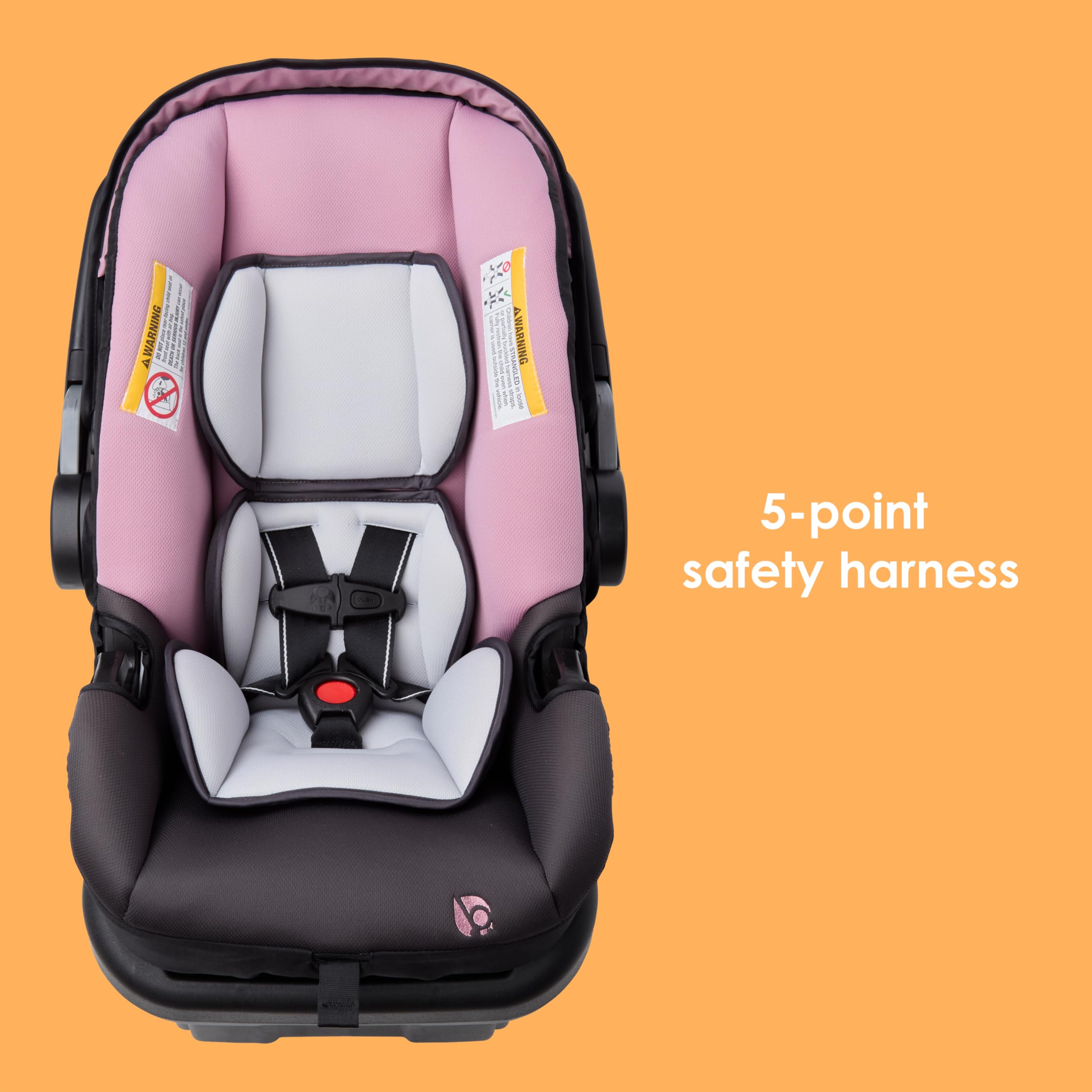 Baby Trend asiento instalado en coche demostrando uso diario y seguridad