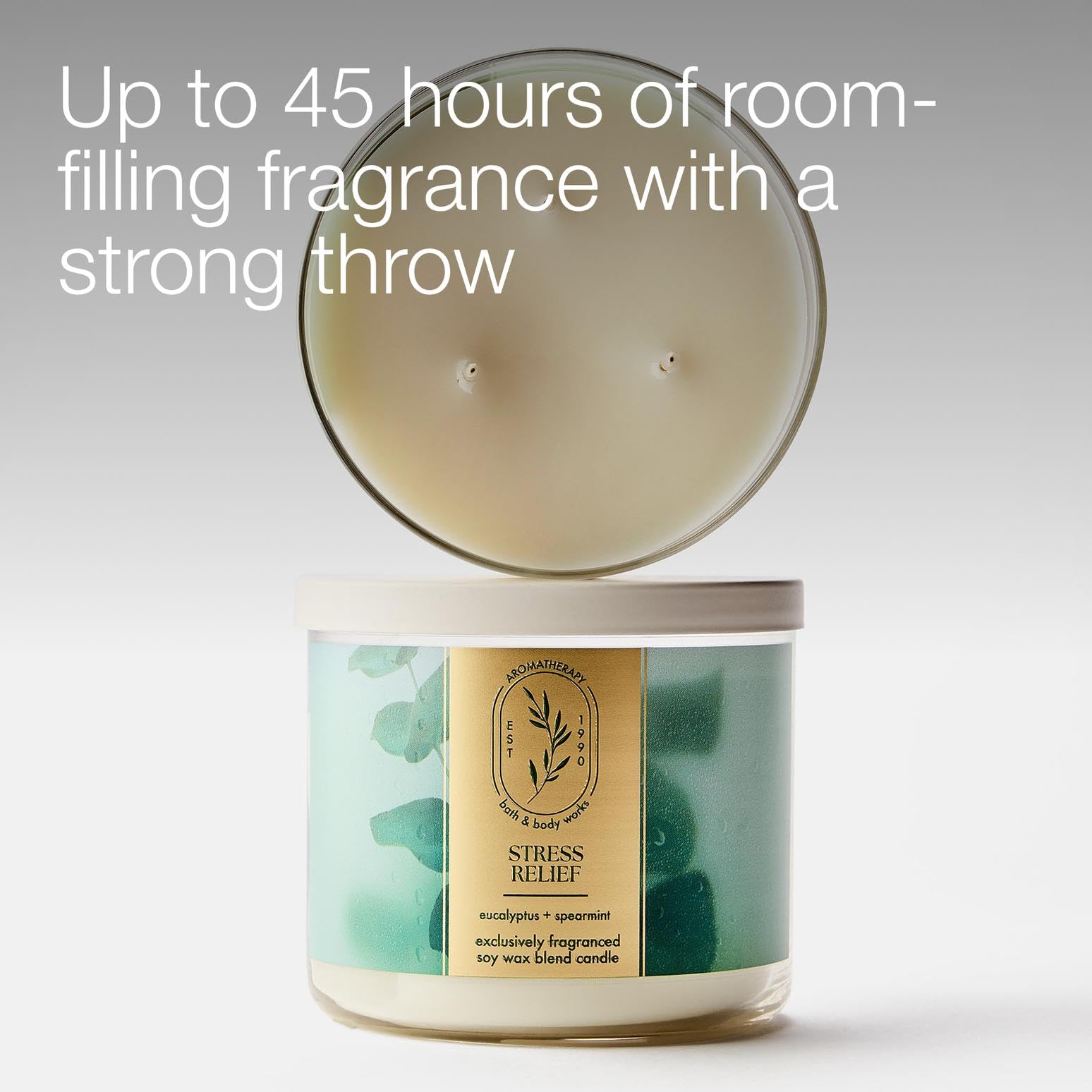 Bath & Body Works candle held in hand to show size and easy placement benefit