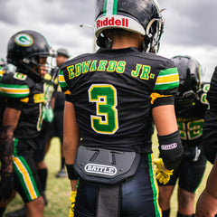 Battle protector en uso por jugador juvenil ofreciendo ajuste seguro