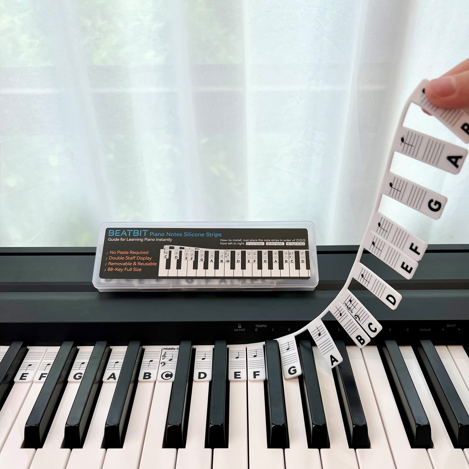 BEATBIT vista frontal del empaque y la tira que facilita aprendizaje rápido