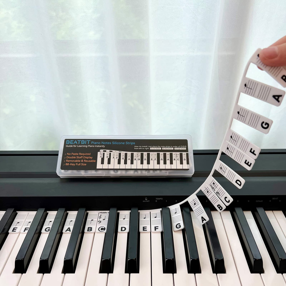 BEATBIT vista frontal del empaque y la tira que facilita aprendizaje rápido