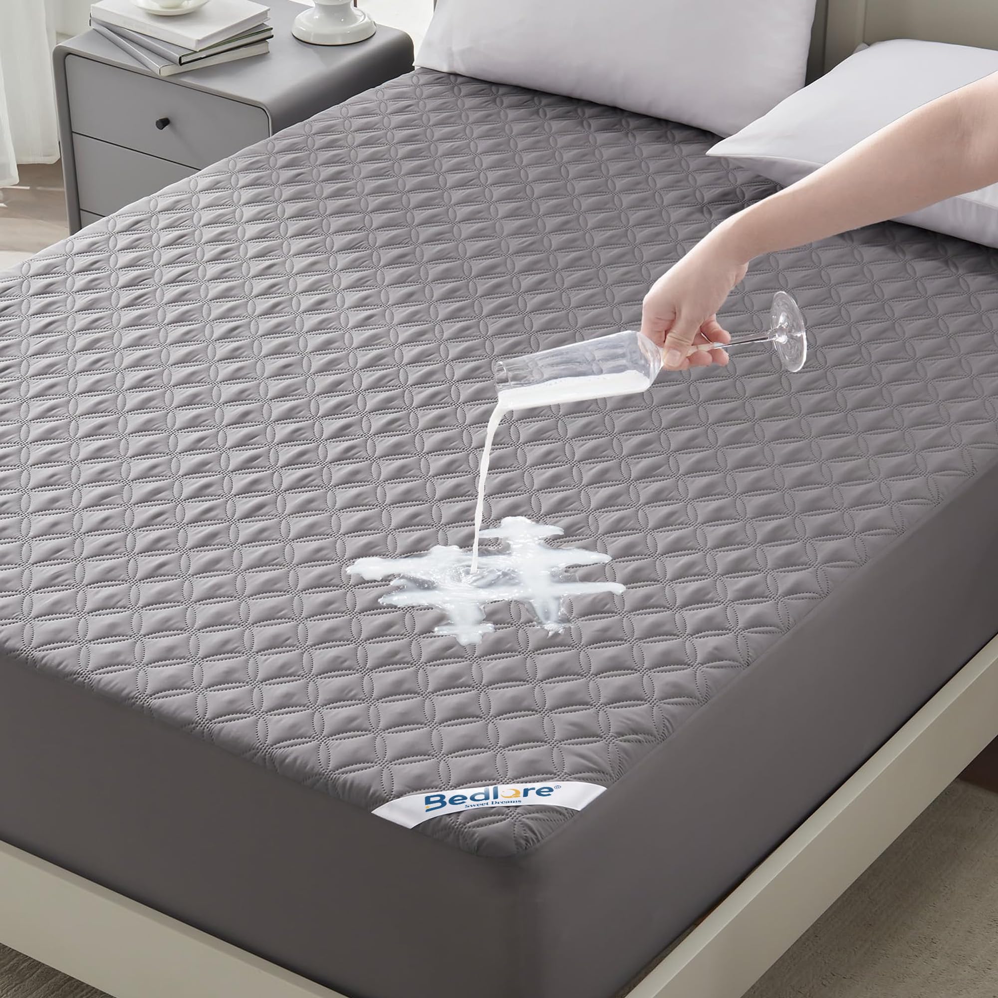 BEDLORE vista frontal del protector y empaque mostrando ajuste king