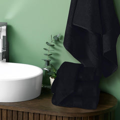 Belizzi Home neatly folded towel stack on shelf showcasing compact storage and organized look