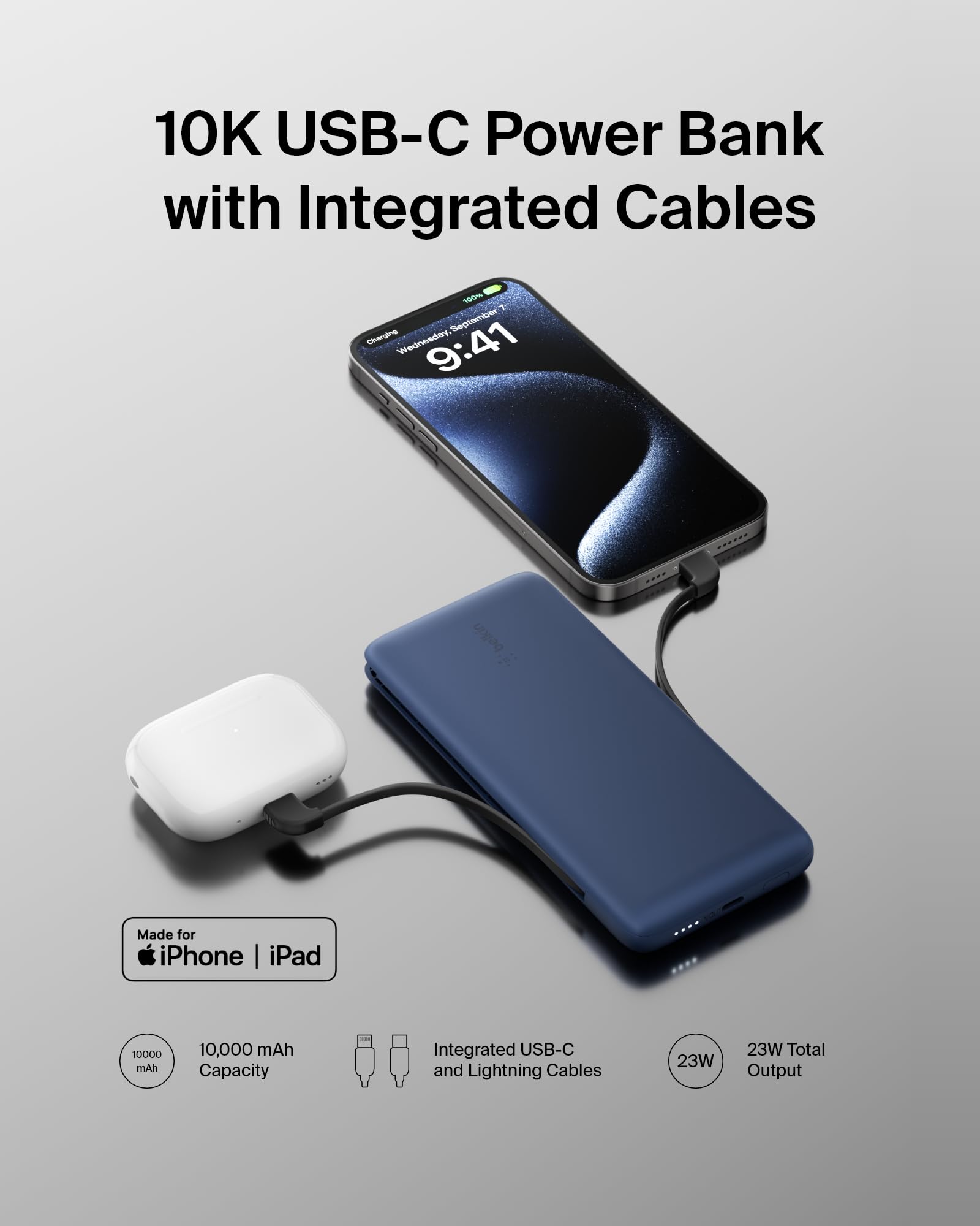 Belkin BoostCharge Plus comparación de tamaño junto a un teléfono para escala