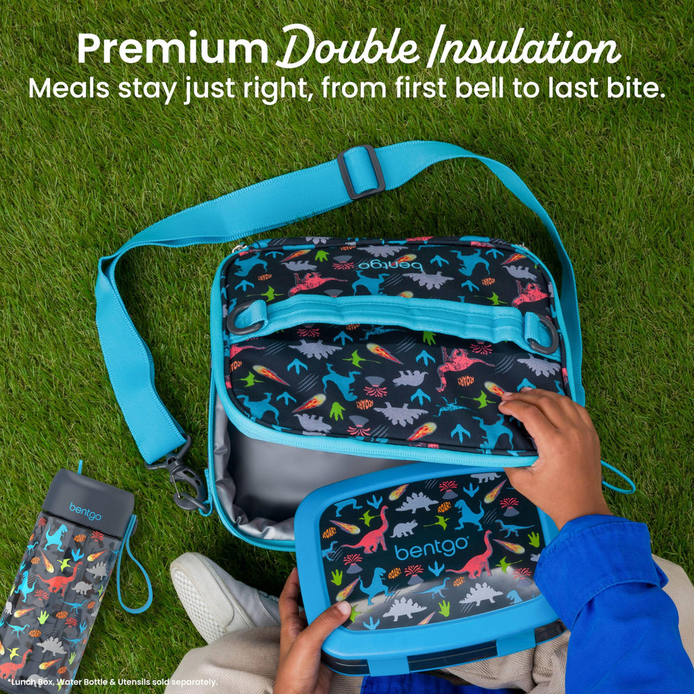 Bentgo lunch bag clipped to backpack for hands-free travel and secure transport