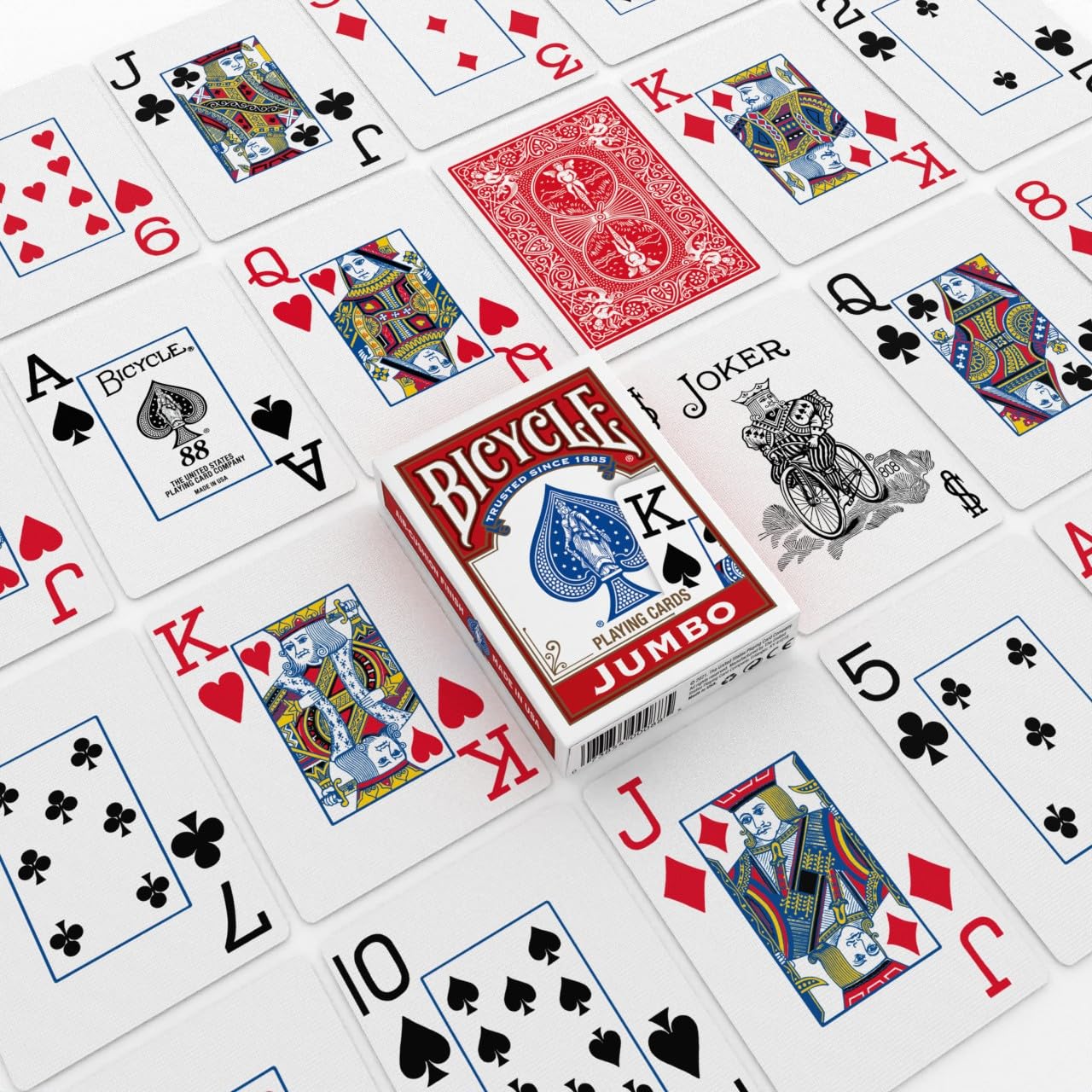 Bicycle cards next to ruler showing poker-size scale and comfortable handling