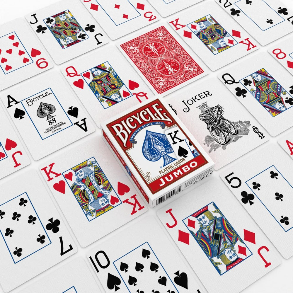 Bicycle cards next to ruler showing poker-size scale and comfortable handling