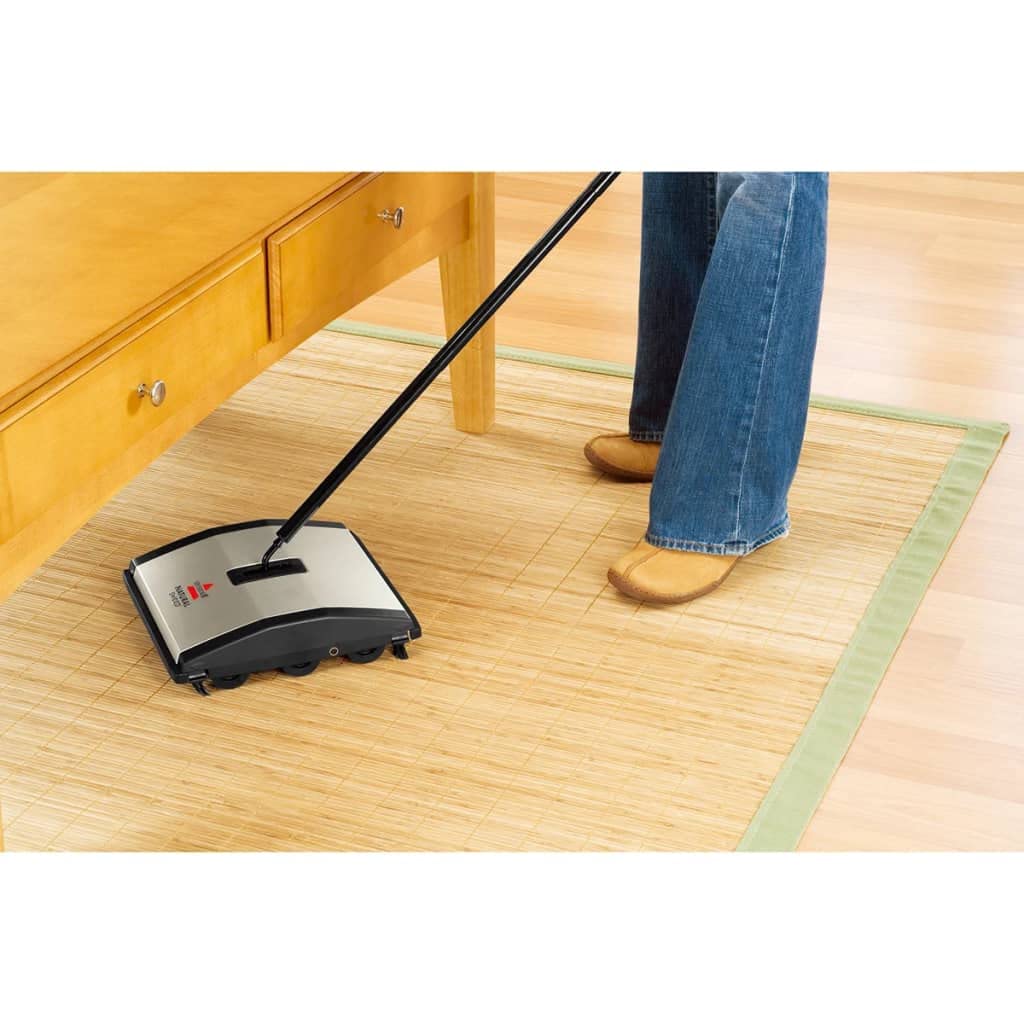Bissell comparación de tamaño con mano para transporte cómodo