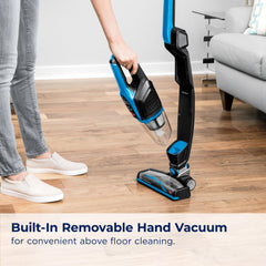 Bissell convertido a aspiradora de mano limpiando tapicería con agility