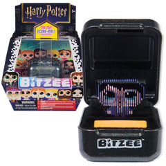 BITZEE cápsula frontal negra y dorada mostrando diseño Hogwarts y atractivo visual