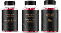 Black Girl Vitamins paquete frontal mostrando los tres productos para belleza y bienestar