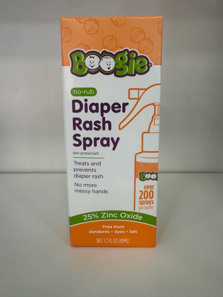 Boogie lifestyle cambio de pañal padre aplicando spray fuera de casa