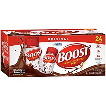 Persona sosteniendo BOOST en mano para consumo inmediato y energía rápida