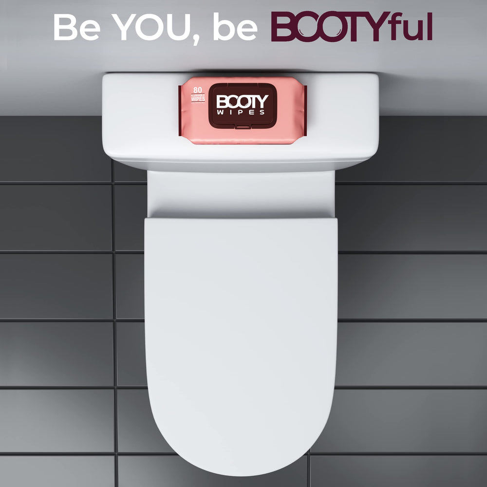 BOOTY WIPES paquete dentro de un bolso femenino, ideal para viajes y gym