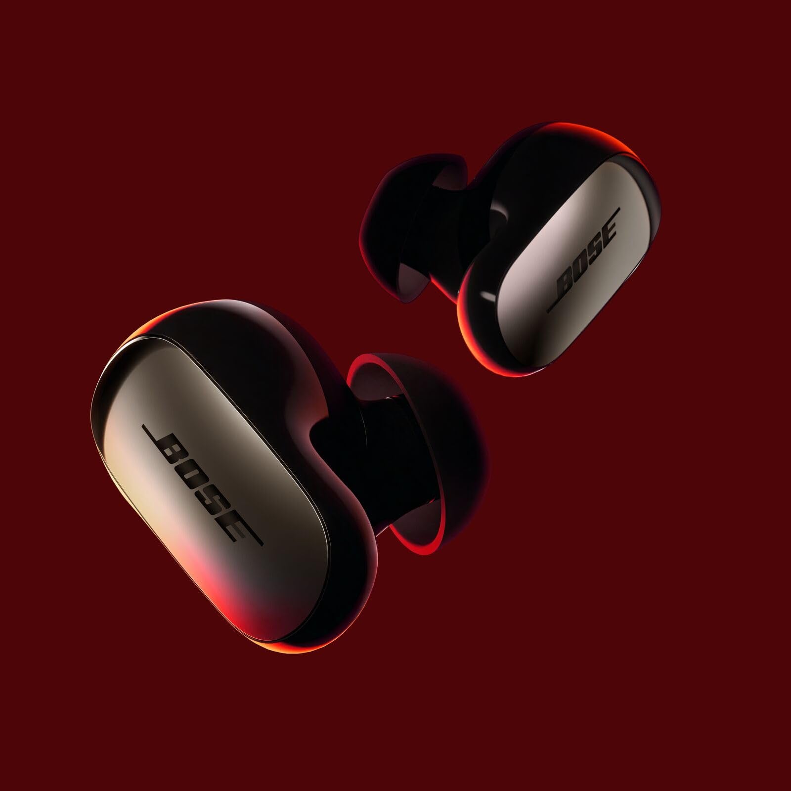 Bose QuietComfort Ultra Earbuds funda abierta mostrando puertos y carga inalámbrica