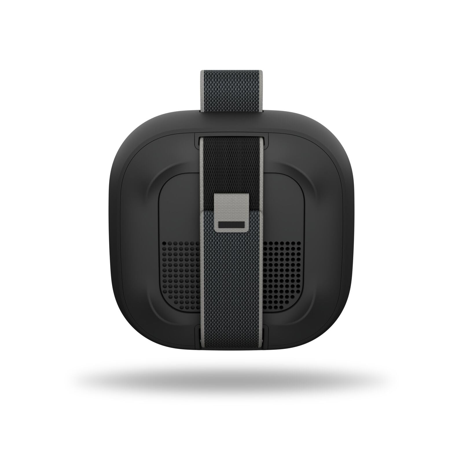 Bose SoundLink Micro comparado en la palma de la mano para referencia de tamaño