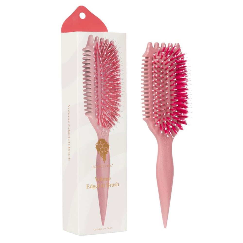 Bounce Curl cepillo frontal Raspberry mostrando forma ergonómica y beneficio de volumen