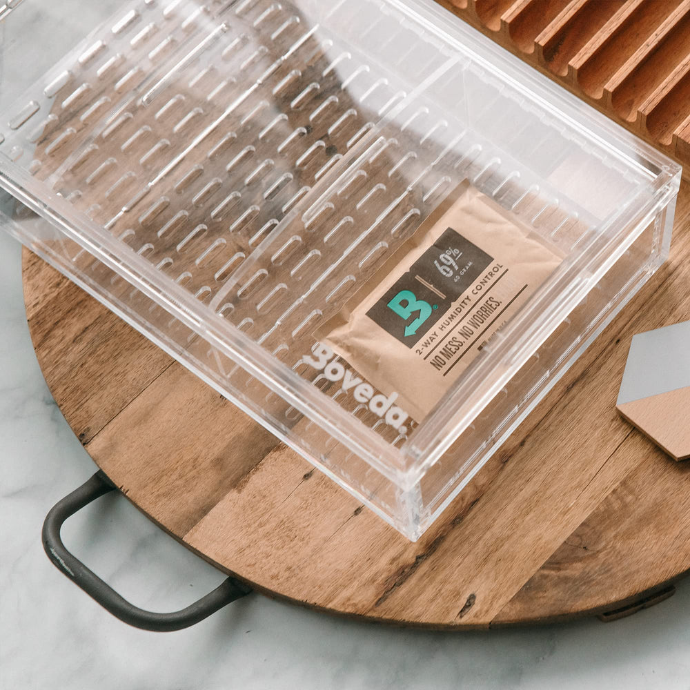 Boveda sobre detalle textura y sello, marca Boveda protege aromas